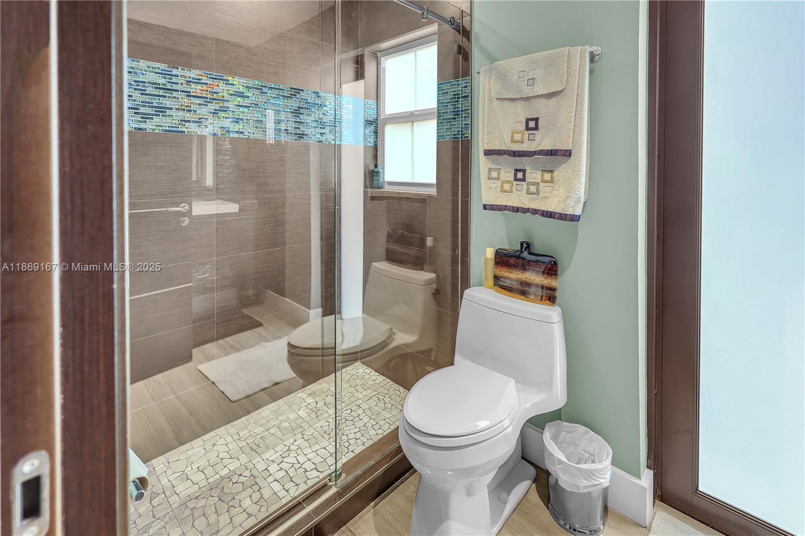 2721 Southwest 153rd Path Miami, FL 33185 - Photo 15 of 42 First Floor Bathroom with outside door to pool