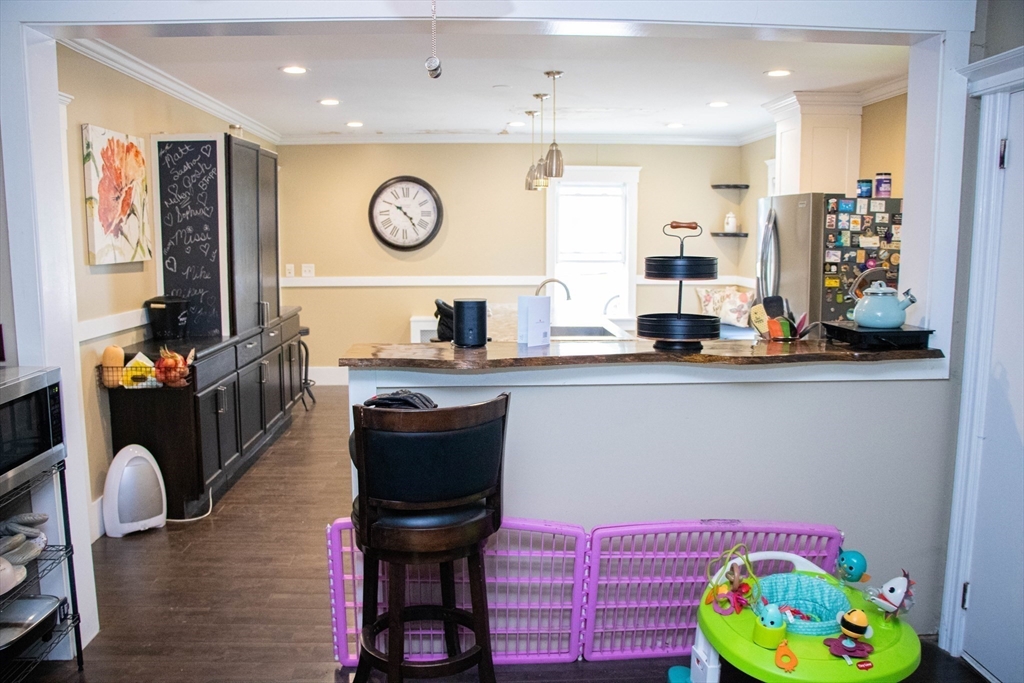 85-87 Slater Street Webster, MA 01570 - Photo 22 of 41 a dining room with furniture and window