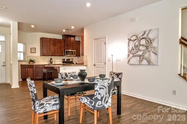 a view of a dining room with furniture