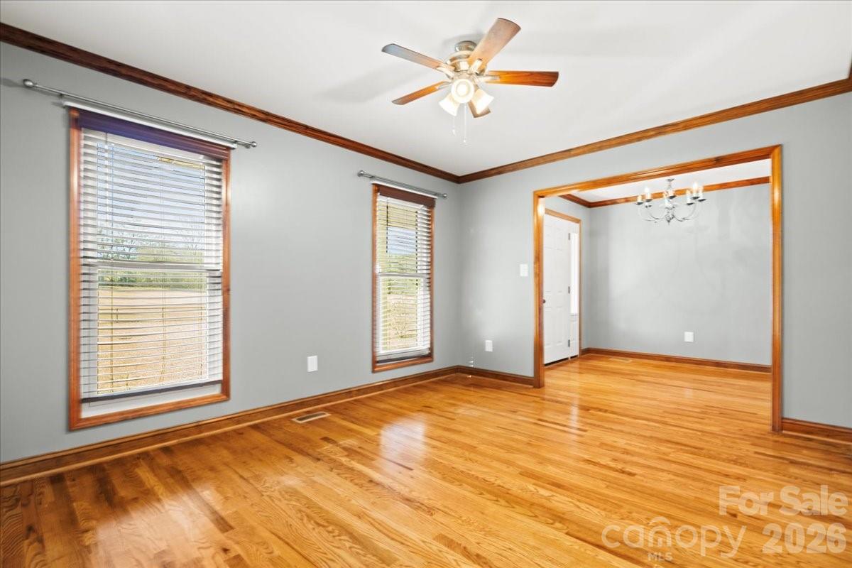 1935 Oakland Church Road Chesterfield, SC 29709 - Photo 12 of 48 an empty room with window and ceiling fan