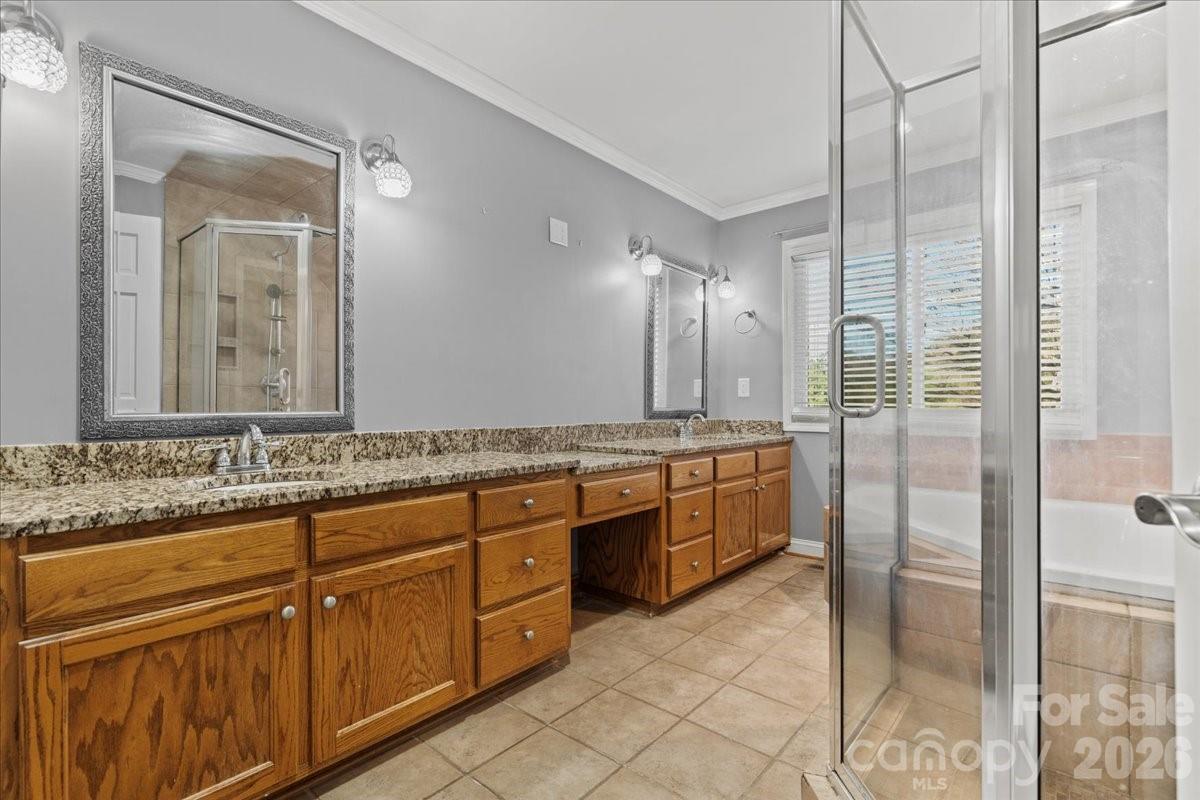 1935 Oakland Church Road Chesterfield, SC 29709 - Photo 33 of 48 a bathroom with a granite countertop sink mirror and