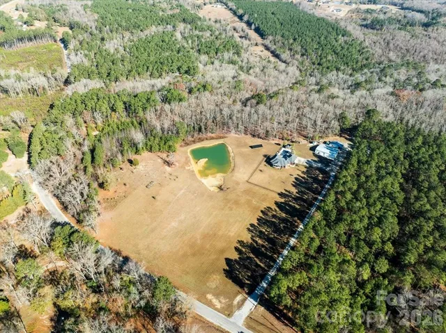 a view of a water pond with green space