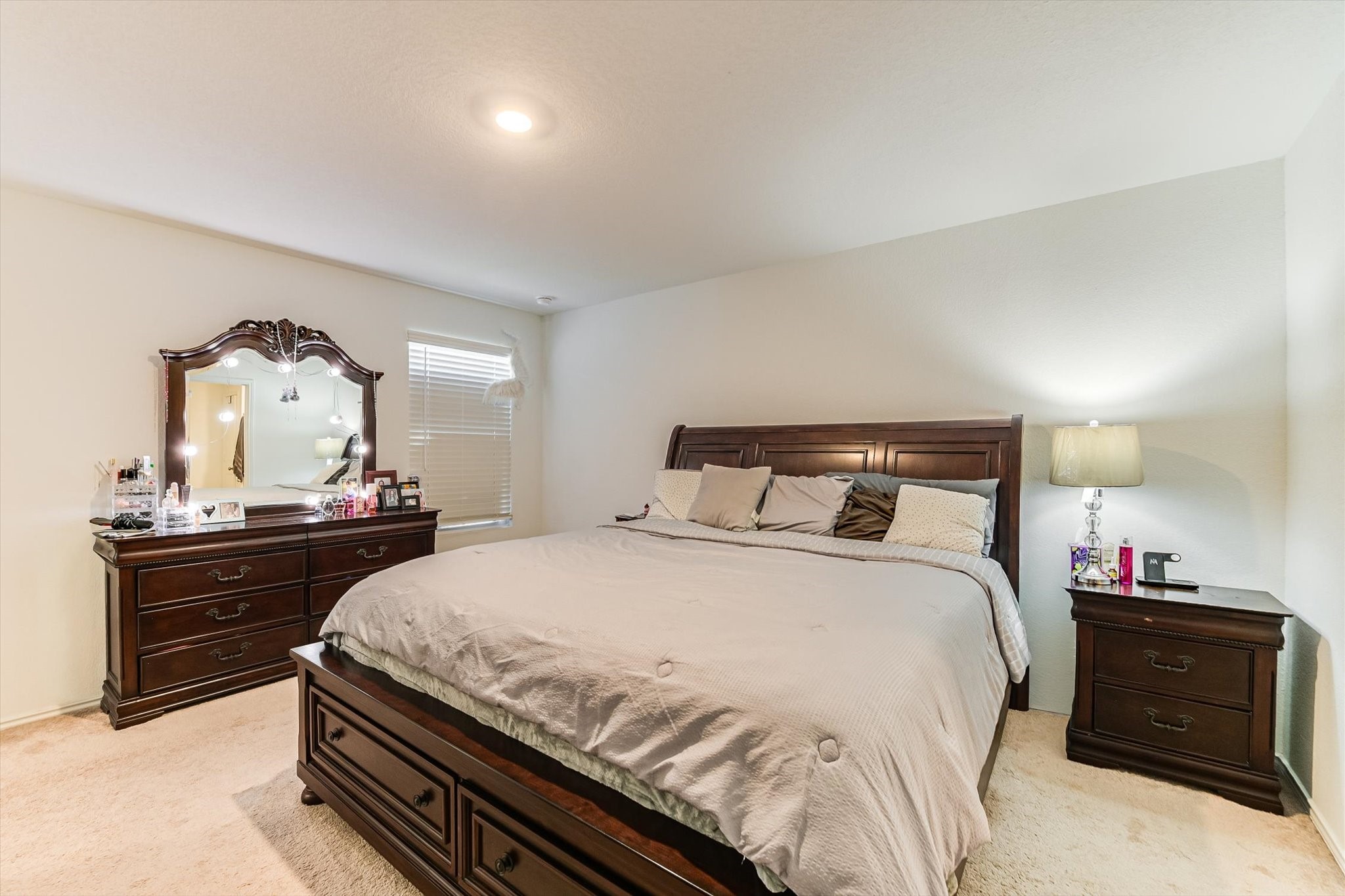 2223 Cumulus Court Lockhart, TX 78644 - Photo 11 of 20 a bedroom with a bed and a dresser