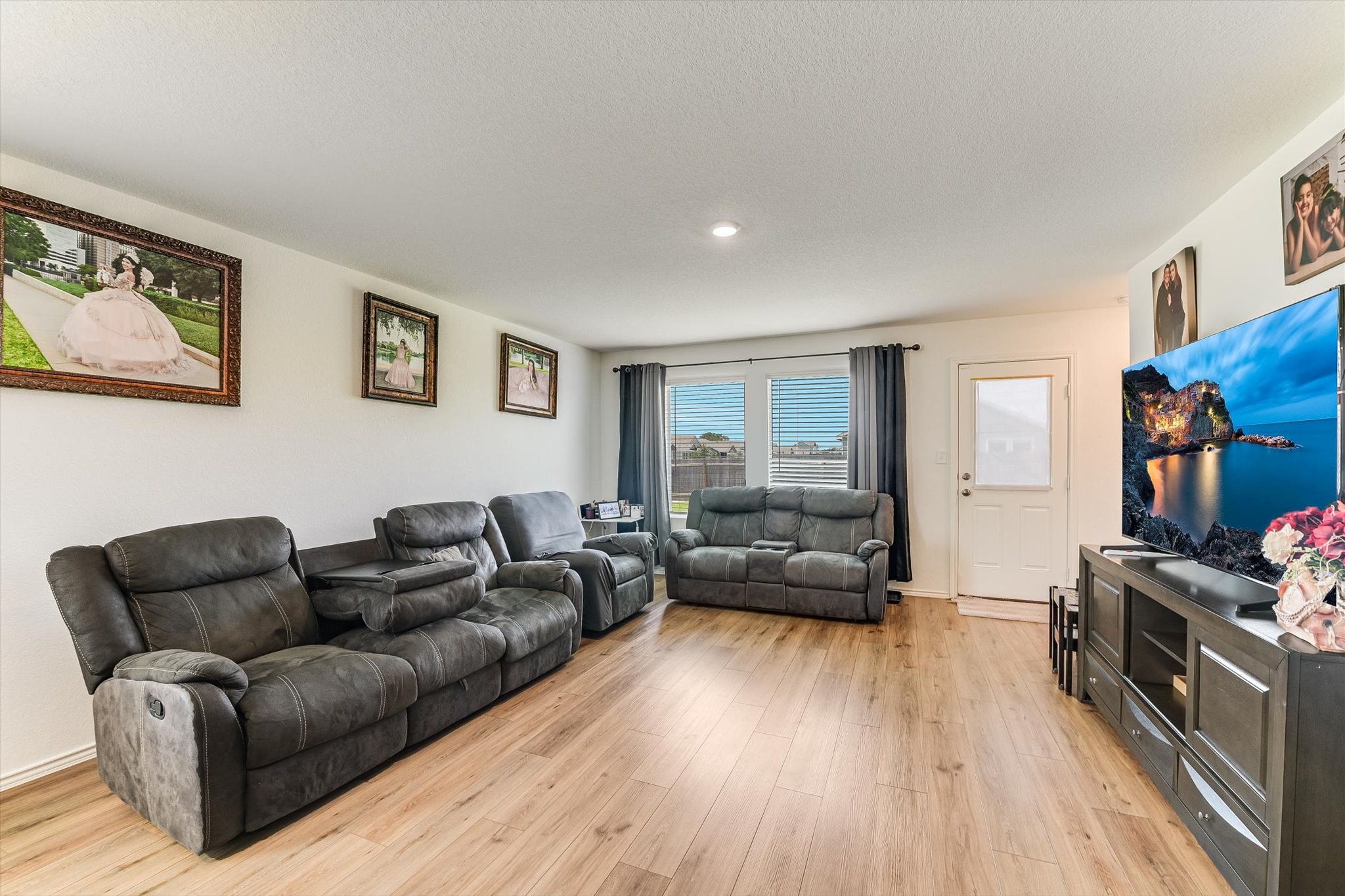 2223 Cumulus Court Lockhart, TX 78644 - Photo 3 of 20 a living room with furniture and a wooden floor