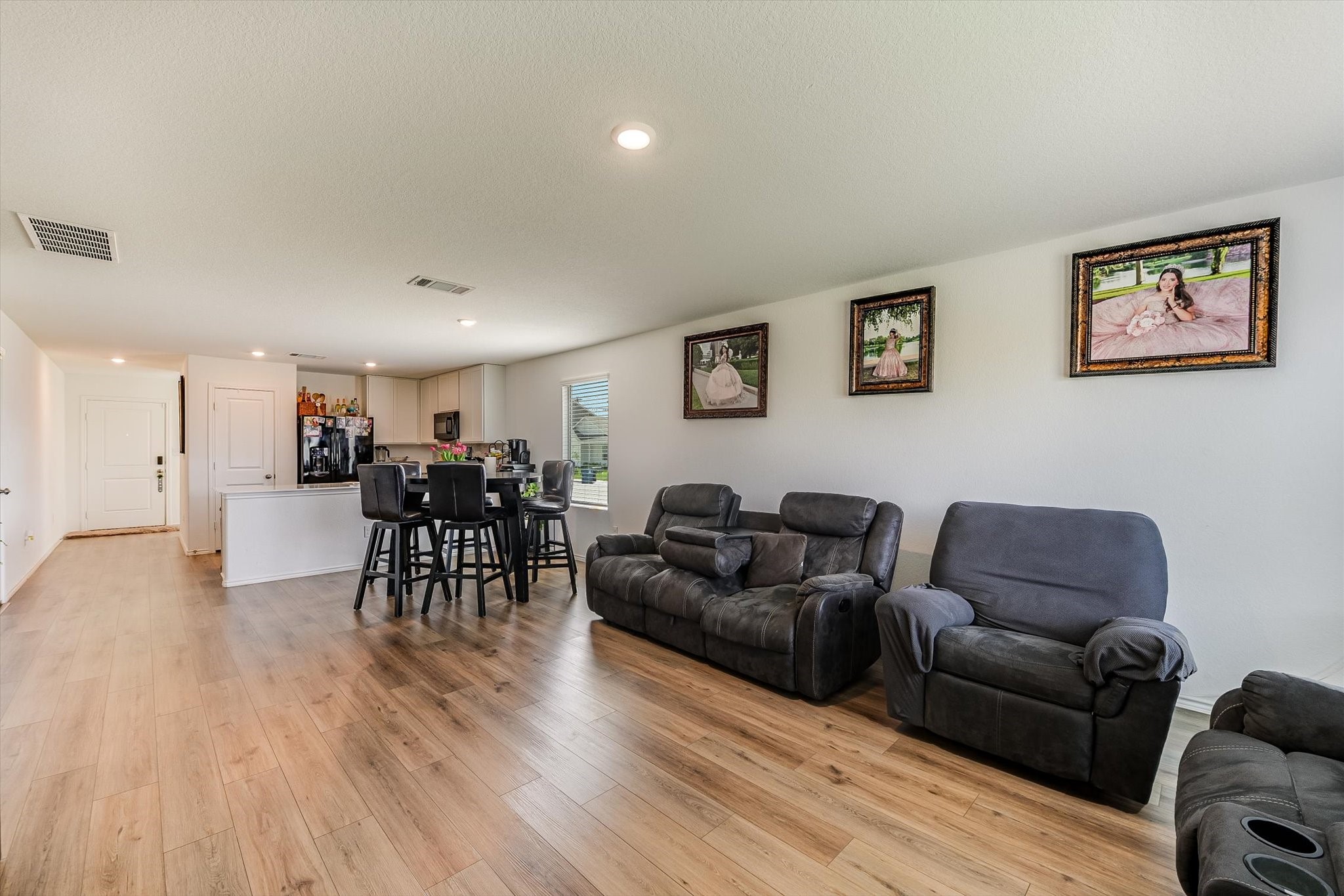 2223 Cumulus Court Lockhart, TX 78644 - Photo 5 of 20 a living room with furniture and a wooden floor