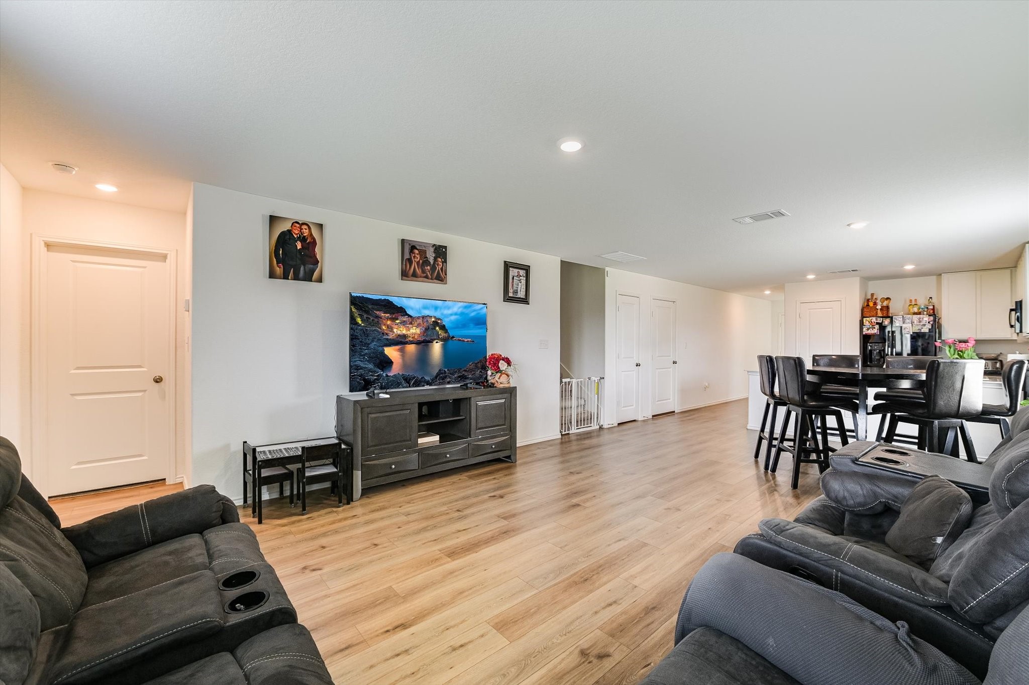 2223 Cumulus Court Lockhart, TX 78644 - Photo 6 of 20 a living room with furniture and a flat screen tv