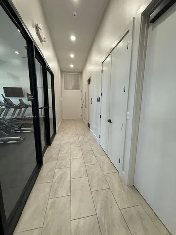 a swimming pool with outdoor seating and yard