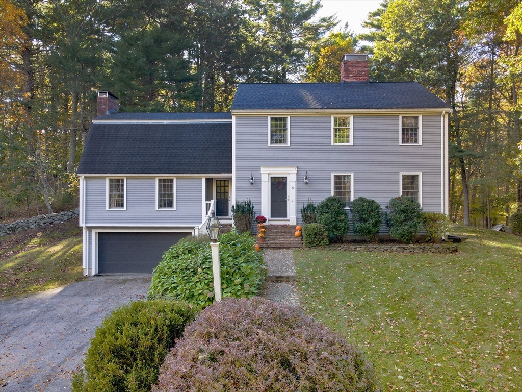 4 Coleman Road Newbury, MA 01922 - Photo 2 of 42 a front view of a house with garden