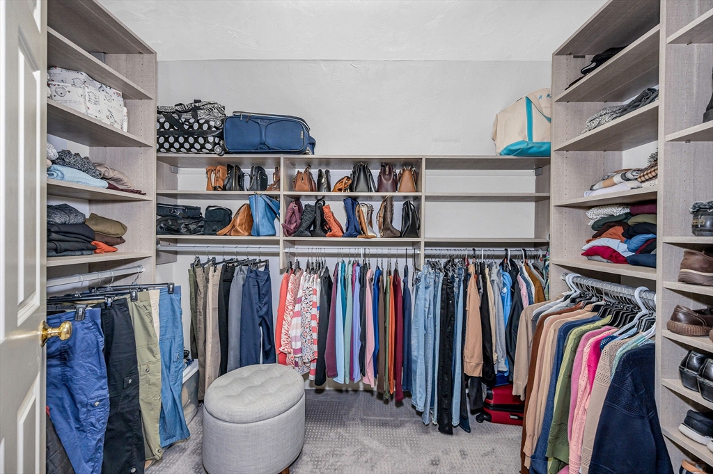 4 Coleman Road Newbury, MA 01922 - Photo 24 of 42 a view of walk in closet with clothes and shoes