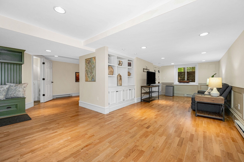 4 Coleman Road Newbury, MA 01922 - Photo 34 of 42 a view of a livingroom with furniture and wooden floor