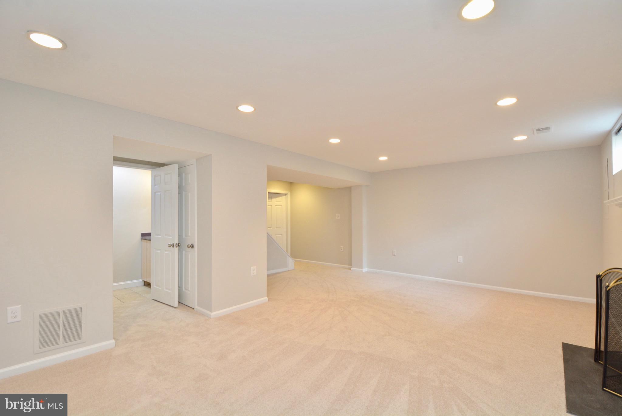 5662 Ridge View Drive Alexandria, VA 22310 - Photo 37 of 43 Recessed Lights on lower level with 3rd full bath