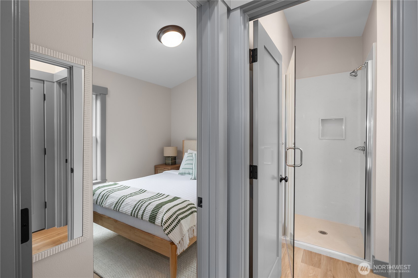 22 Bungalow Loop Pacific Beach, WA 98571 - Photo 12 of 34 a bedroom with a bed and a shower