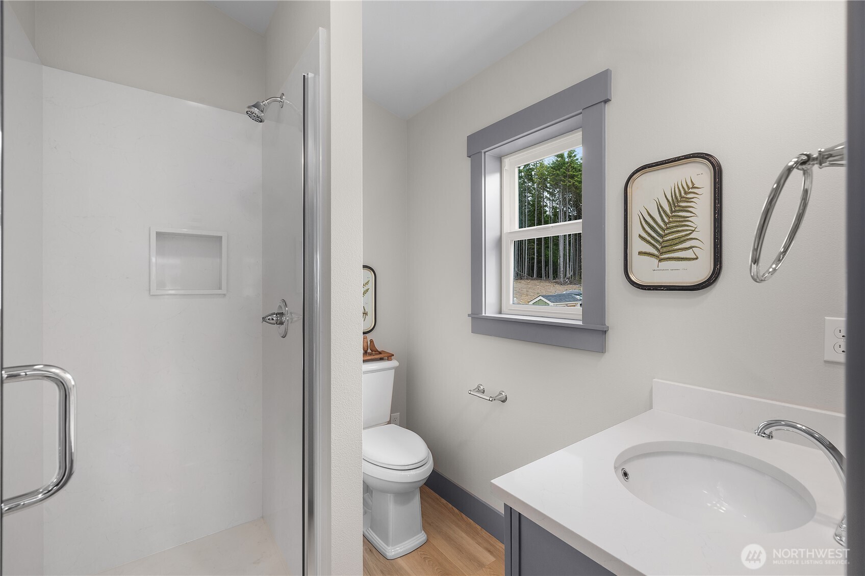 22 Bungalow Loop Pacific Beach, WA 98571 - Photo 15 of 34 a bathroom with a sink and a toilet