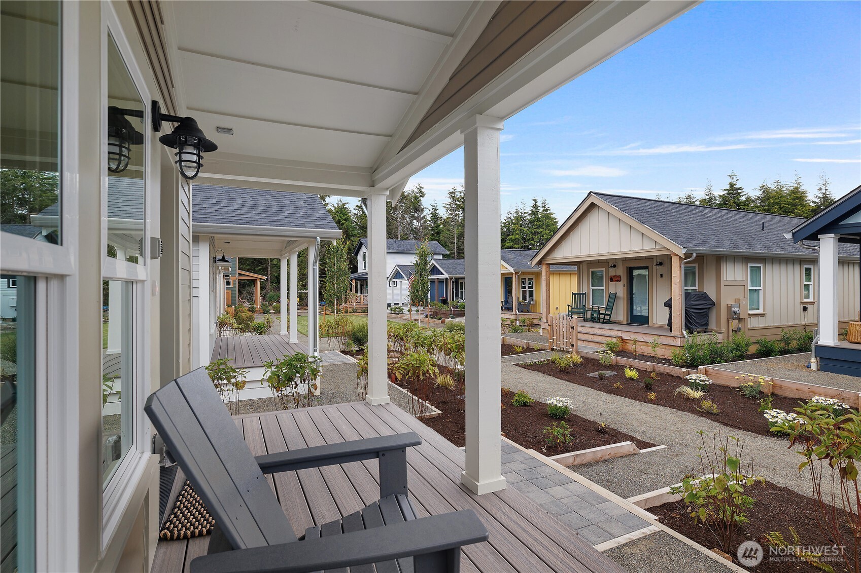 22 Bungalow Loop Pacific Beach, WA 98571 - Photo 4 of 34 a view of house with a chairs and table in a patio