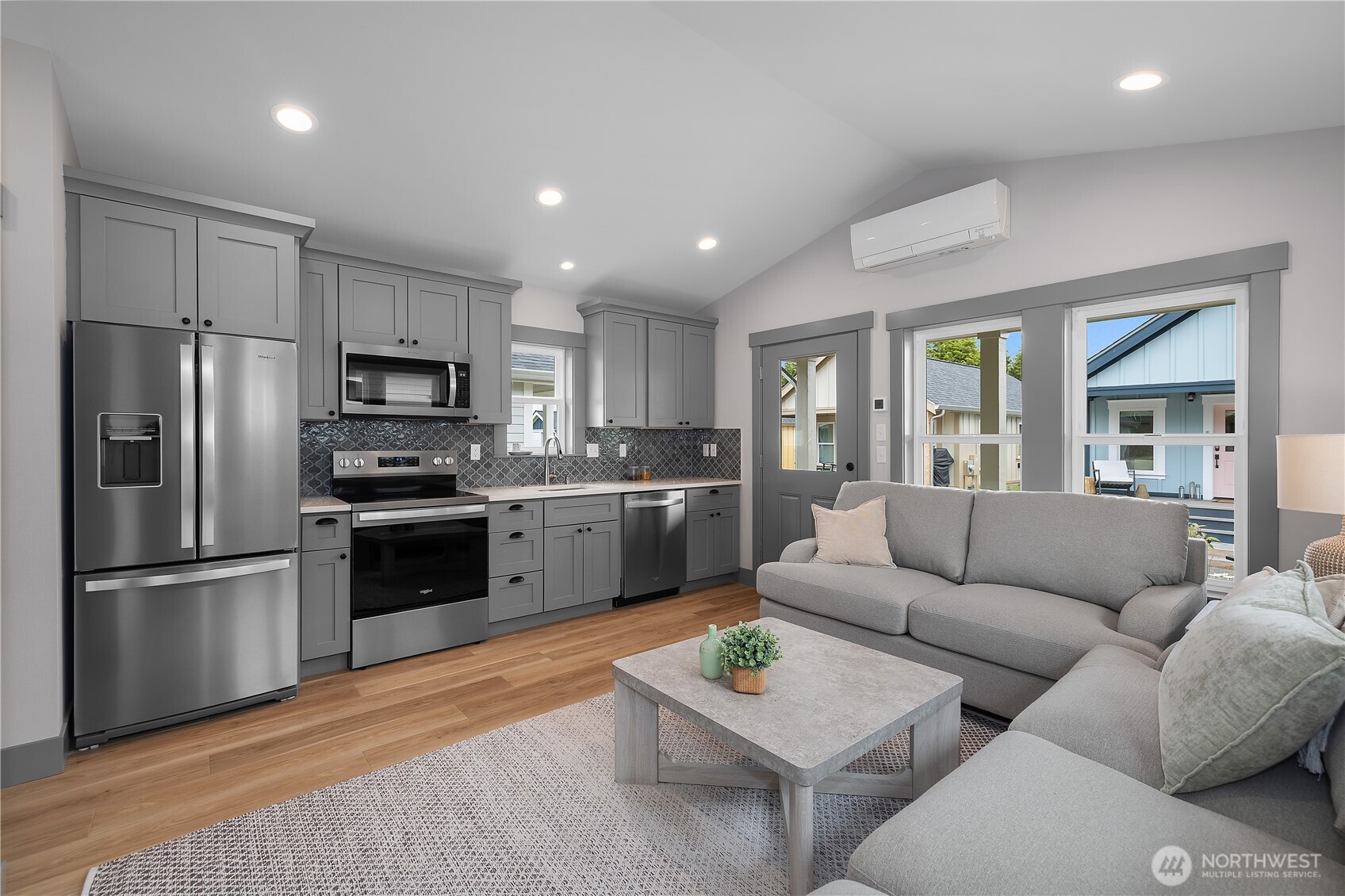 22 Bungalow Loop Pacific Beach, WA 98571 - Photo 7 of 34 a living room with stainless steel appliances furniture and a kitchen