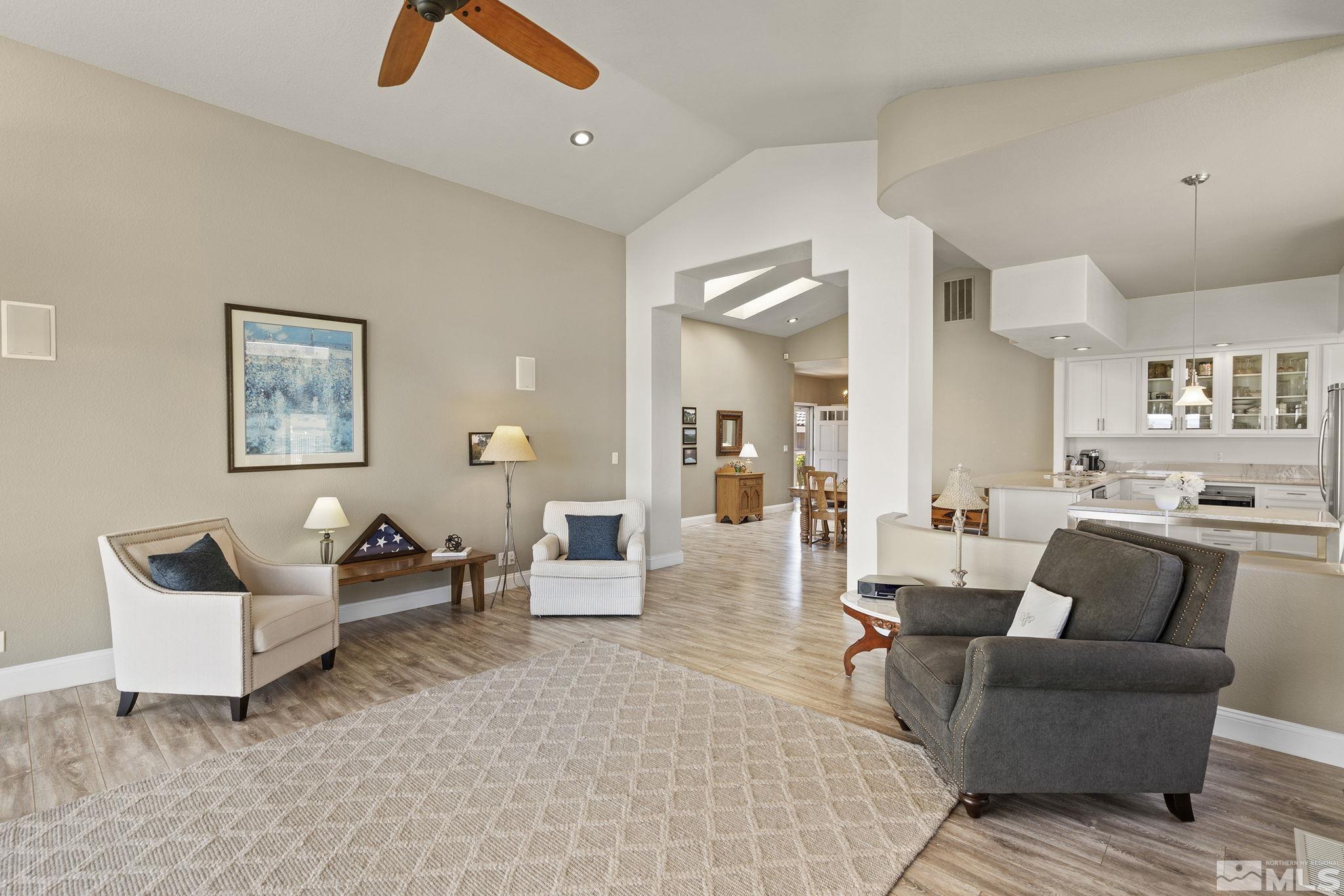 2553 Granite Springs Road Reno, NV 89519 - Photo 21 of 38 a living room with furniture and a wooden floor