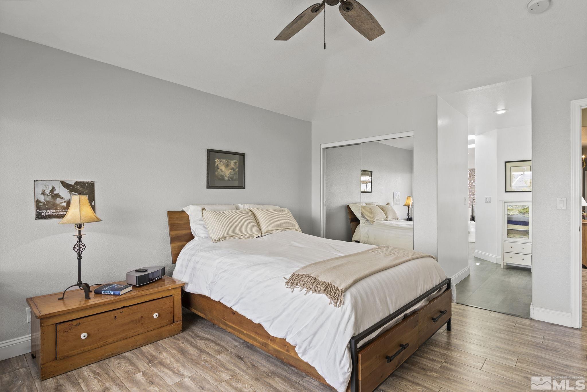 2553 Granite Springs Road Reno, NV 89519 - Photo 23 of 38 a bedroom with a bed and dresser