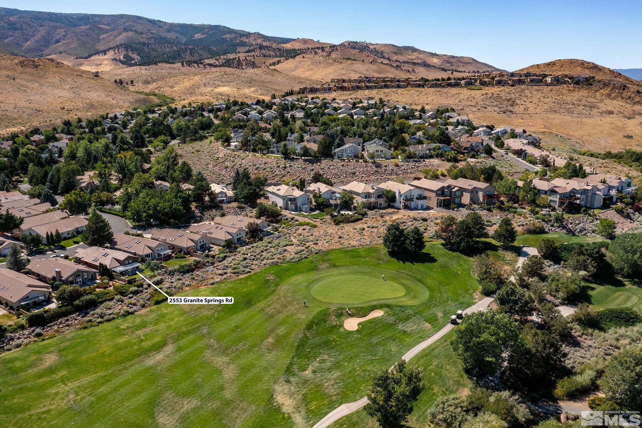 2553 Granite Springs Road Reno, NV 89519 - Photo 29 of 38 an aerial view of residential houses with outdoor space and trees