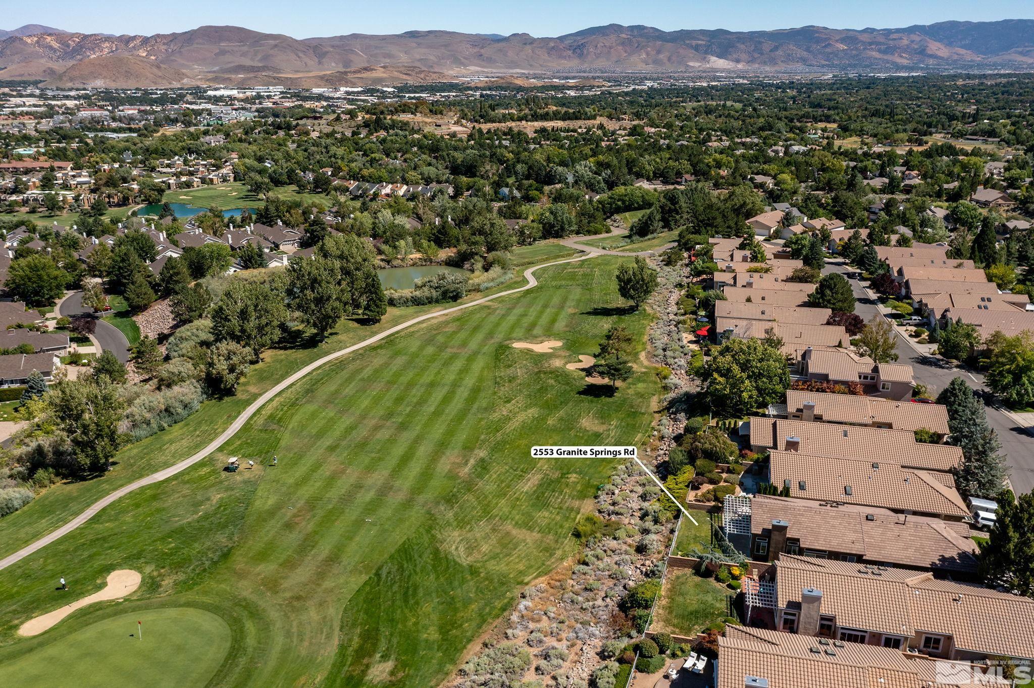 2553 Granite Springs Road Reno, NV 89519 - Photo 3 of 38 an aerial view of residential houses with outdoor space