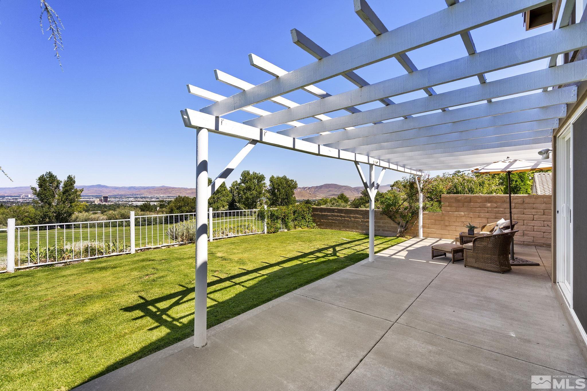 2553 Granite Springs Road Reno, NV 89519 - Photo 33 of 38 a view of a swimming pool with a patio