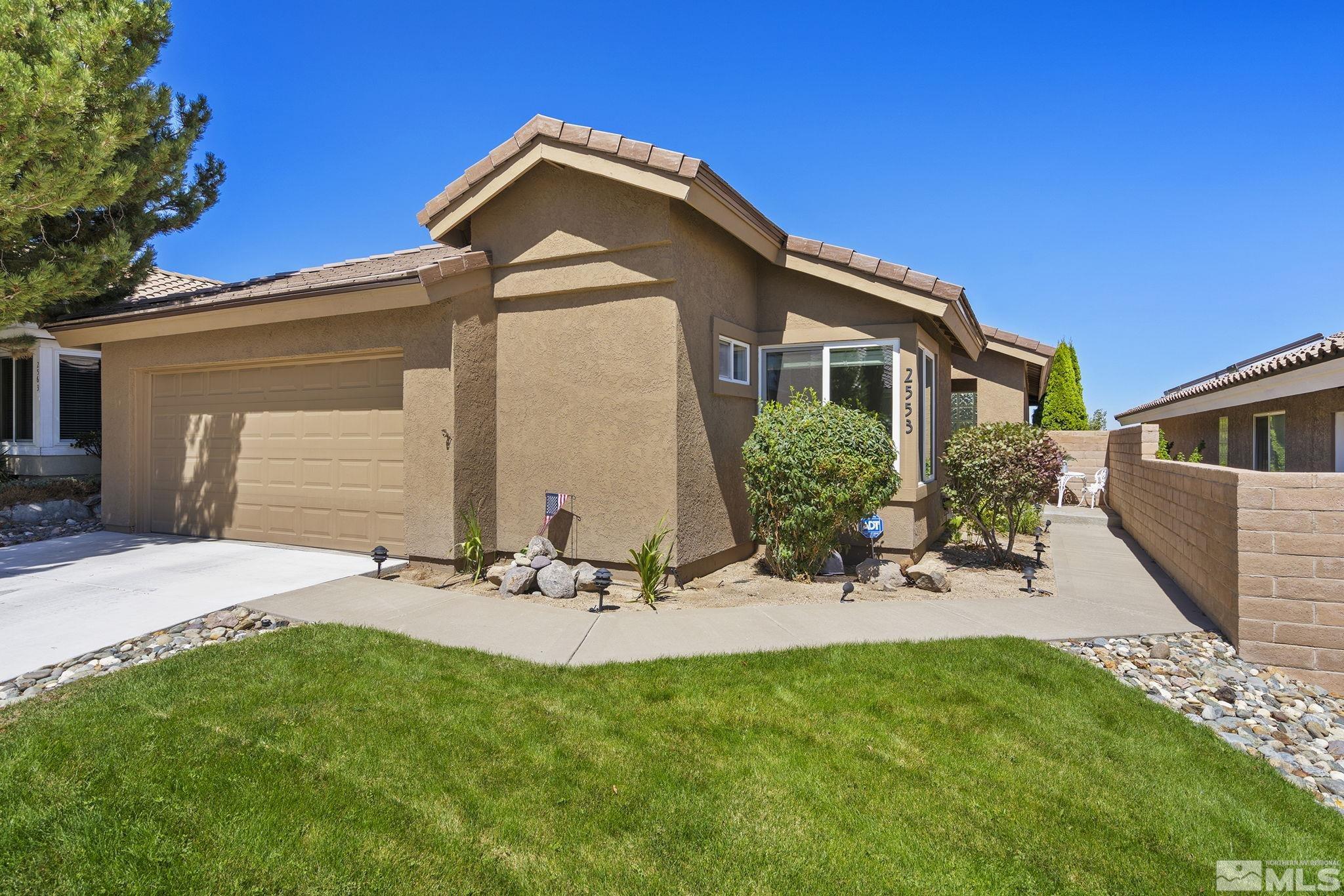 2553 Granite Springs Road Reno, NV 89519 - Photo 38 of 38 a front view of a house with a yard