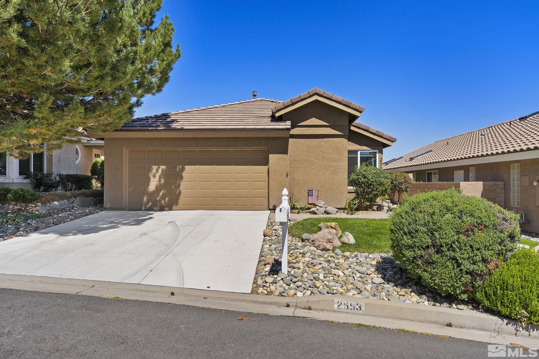 2553 Granite Springs Road Reno, NV 89519 - Photo 6 of 38 front view of a house with a street