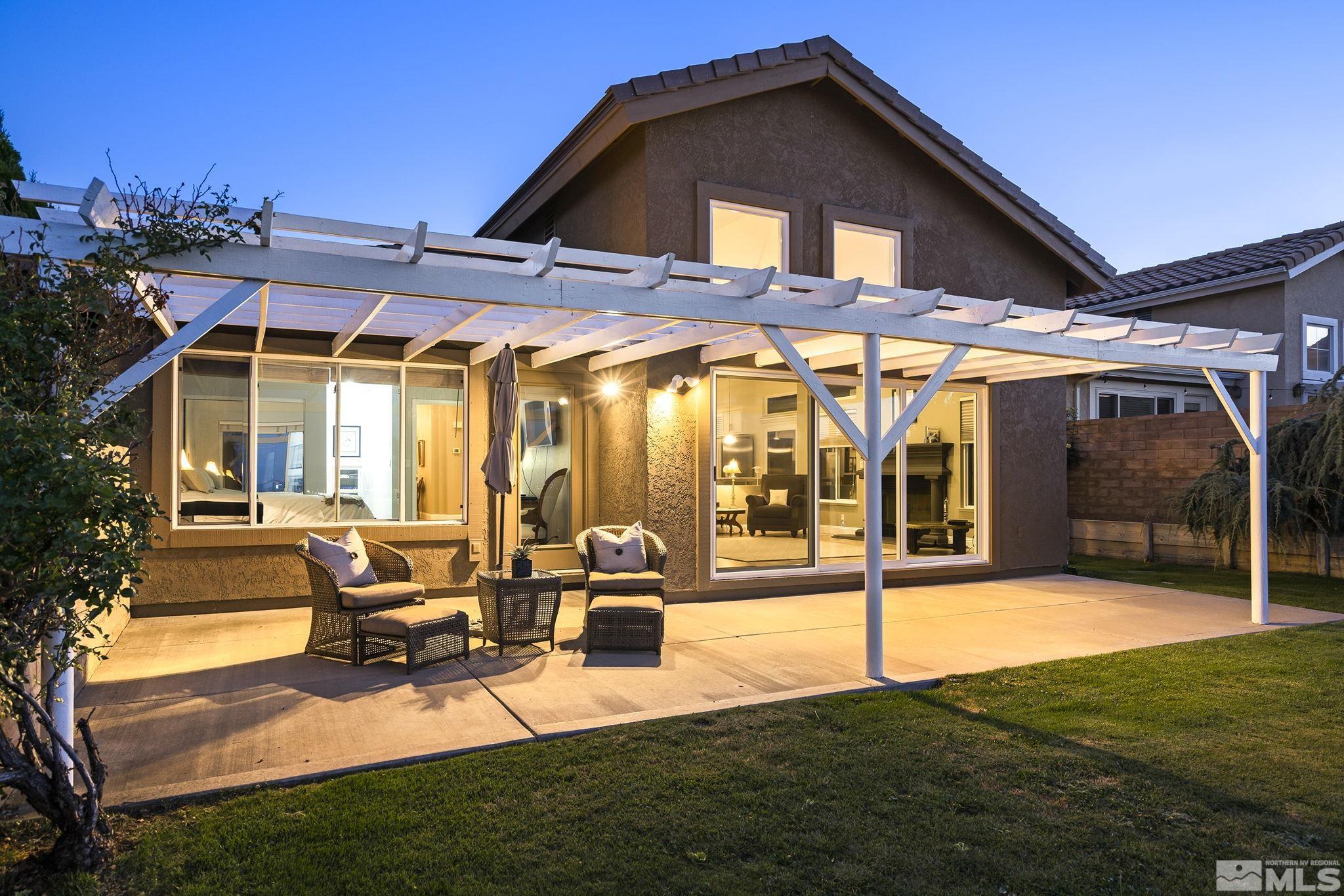 2553 Granite Springs Road Reno, NV 89519 - Photo 9 of 38 a view of a house with backyard porch and sitting area