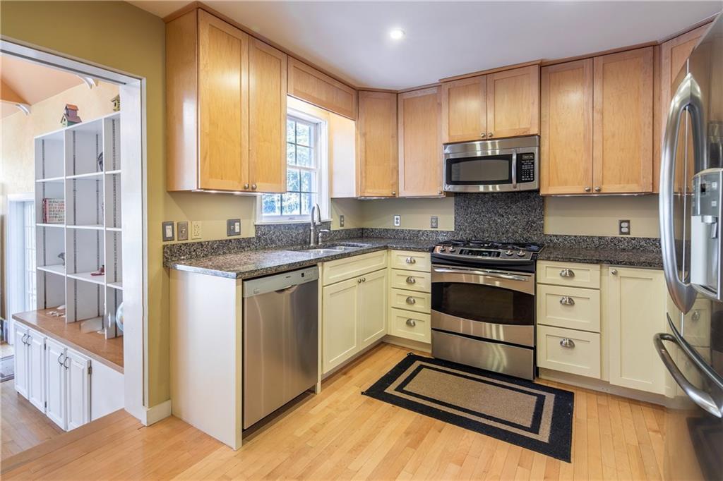 50 Fernald Road Freeport, ME 04032 - Photo 3 of 28 Custom cabinets that extend to the...