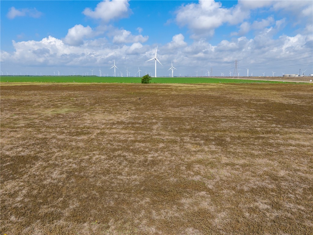 4323 Kestrel Lane Portland, TX 78390 - Photo 8 of 8 a view of an ocean beach and a houses