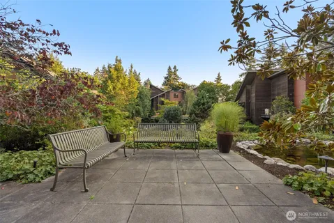 a view of a terrace with sitting area