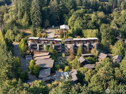 an aerial view of a house with a garden