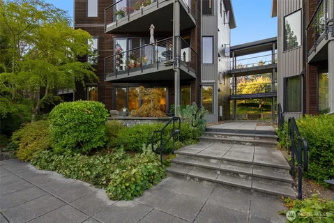 a view of a pathway along the building