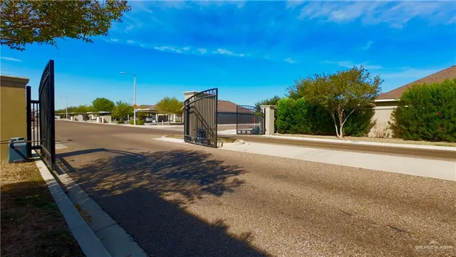 a view of a street with a building in the background