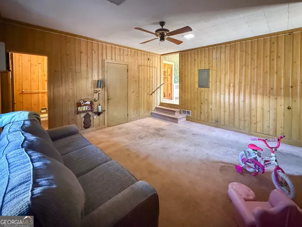 a bed room with a bed and a couch