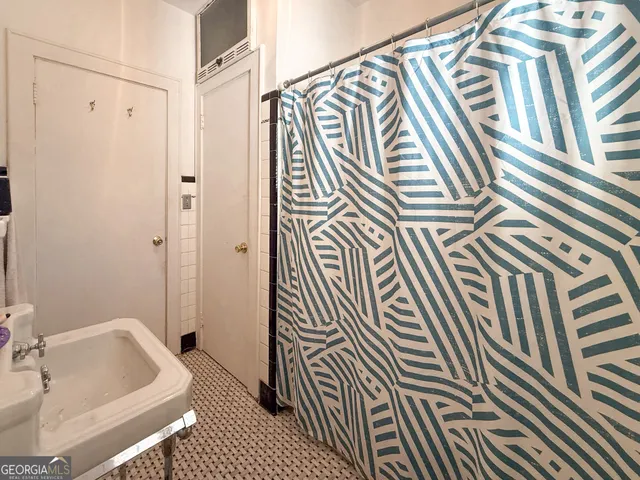 a bathroom with a sink and a bathtub