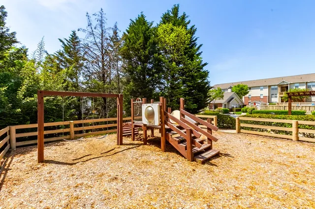 a room with gym equipment and a window