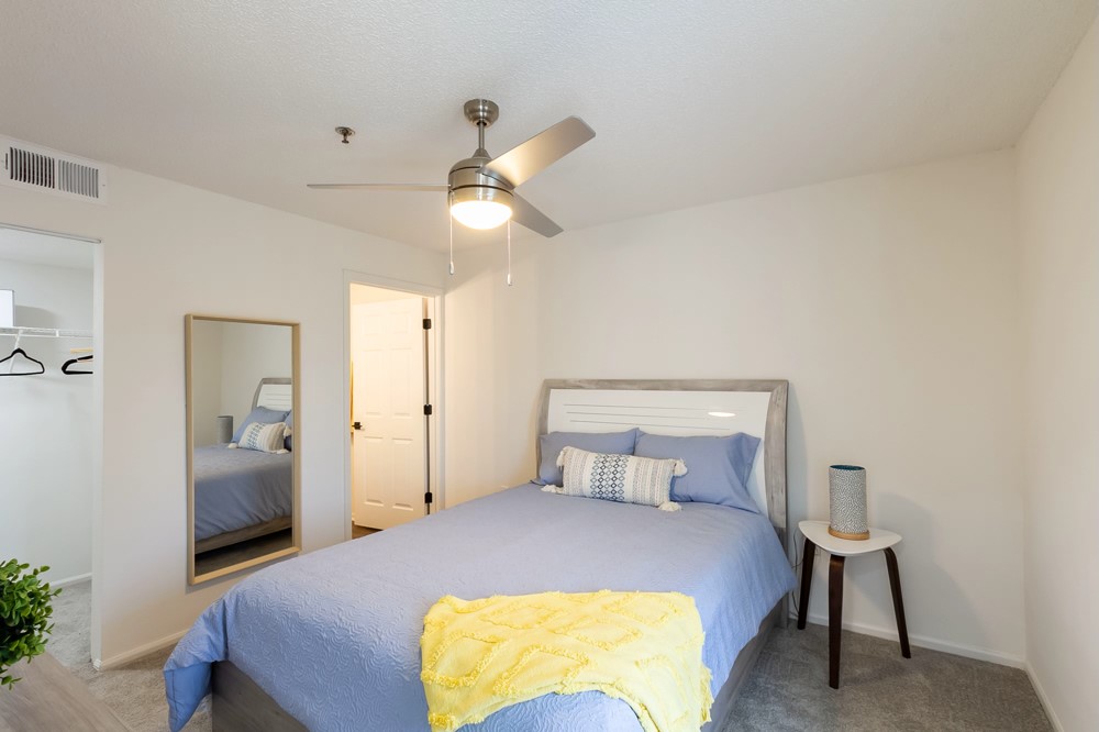 835 Oglethorpe Avenue Southwest Atlanta, GA 30310 - Photo 30 of 39 a bedroom with a bed and a chandelier