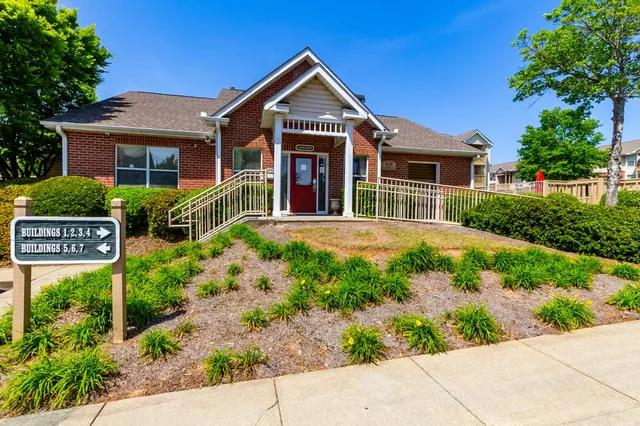 front view of a house with a small yard