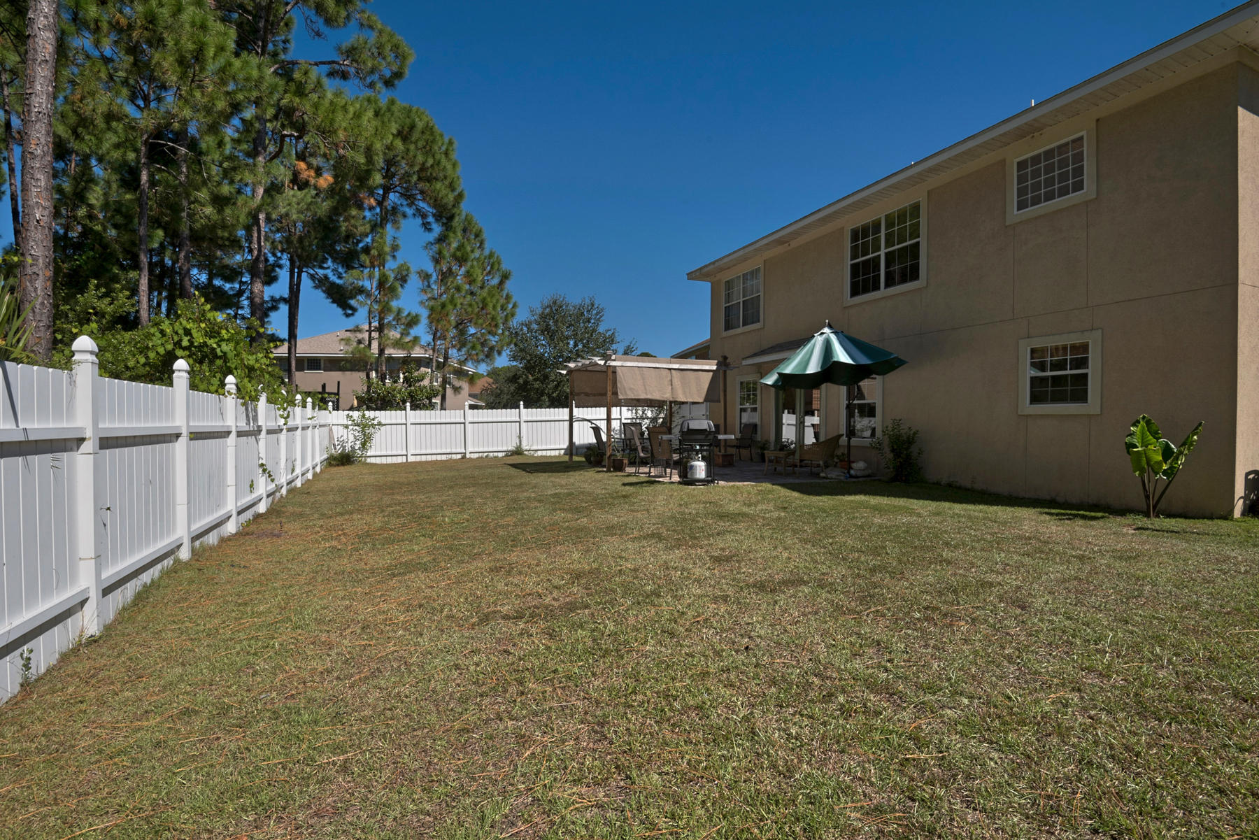 30 Red Maple Court Santa Rosa Beach, FL 32459 - Photo 19 of 36 a view of house with backyard and tree
