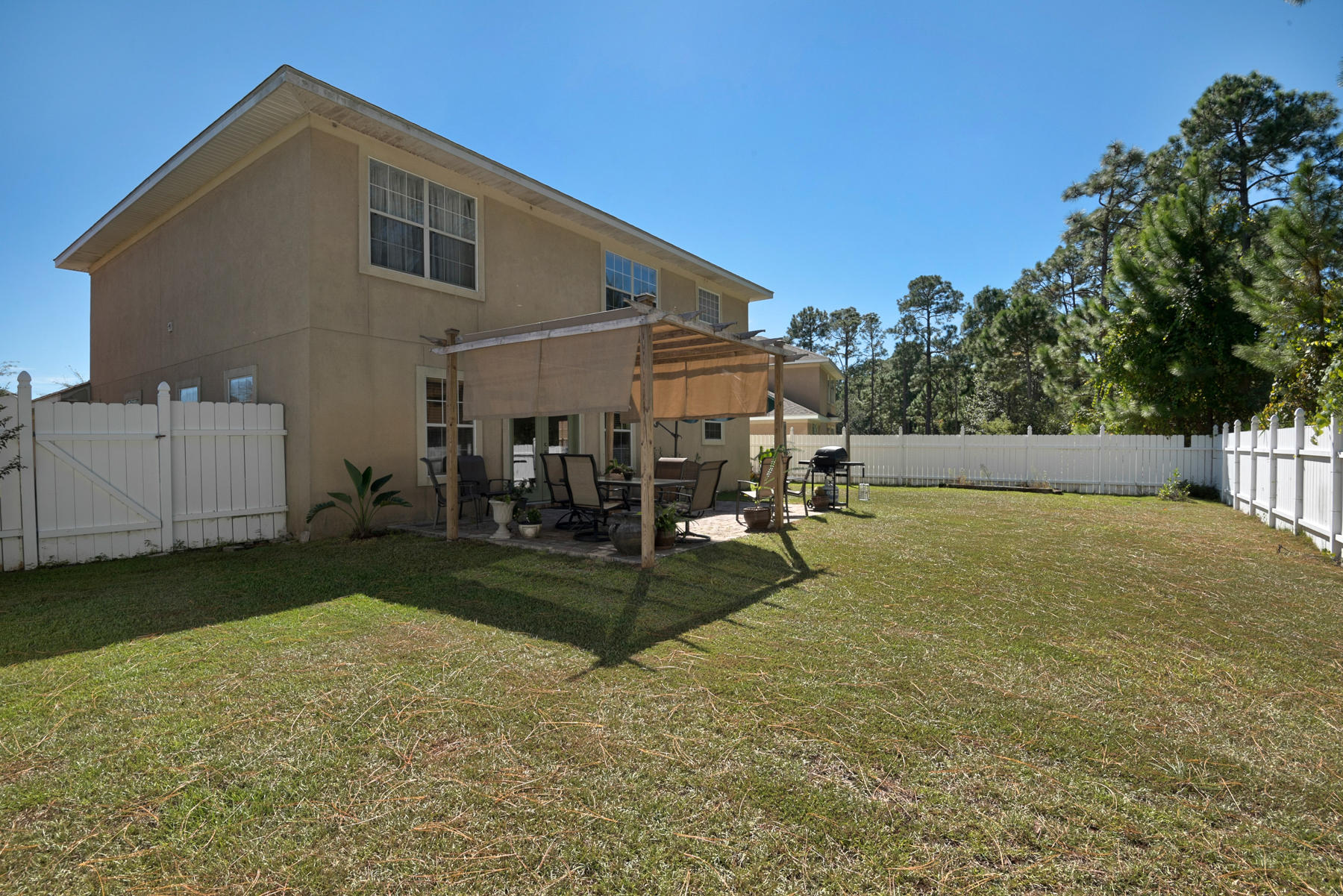 30 Red Maple Court Santa Rosa Beach, FL 32459 - Photo 20 of 36 a view of a backyard of the house