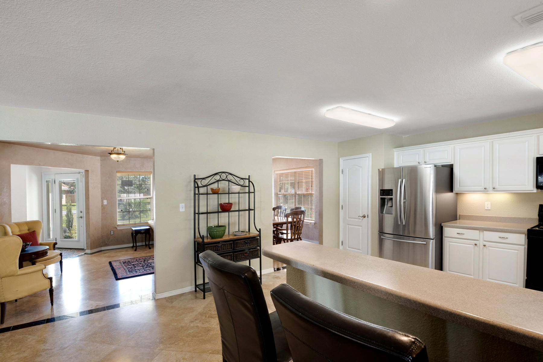 30 Red Maple Court Santa Rosa Beach, FL 32459 - Photo 25 of 36 a large kitchen with a table and chairs