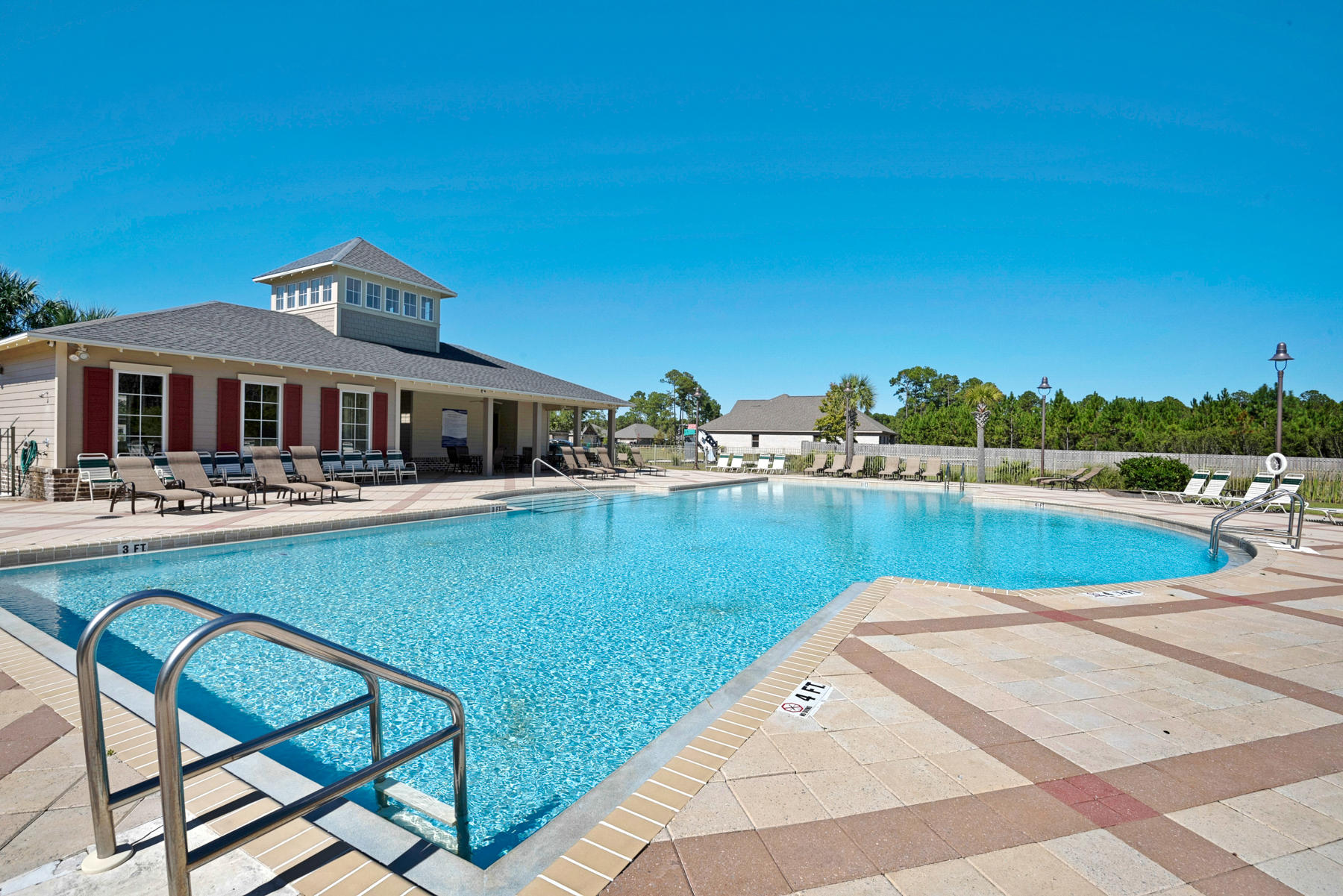 30 Red Maple Court Santa Rosa Beach, FL 32459 - Photo 35 of 36 a view of swimming pool with seating area and trees in the background