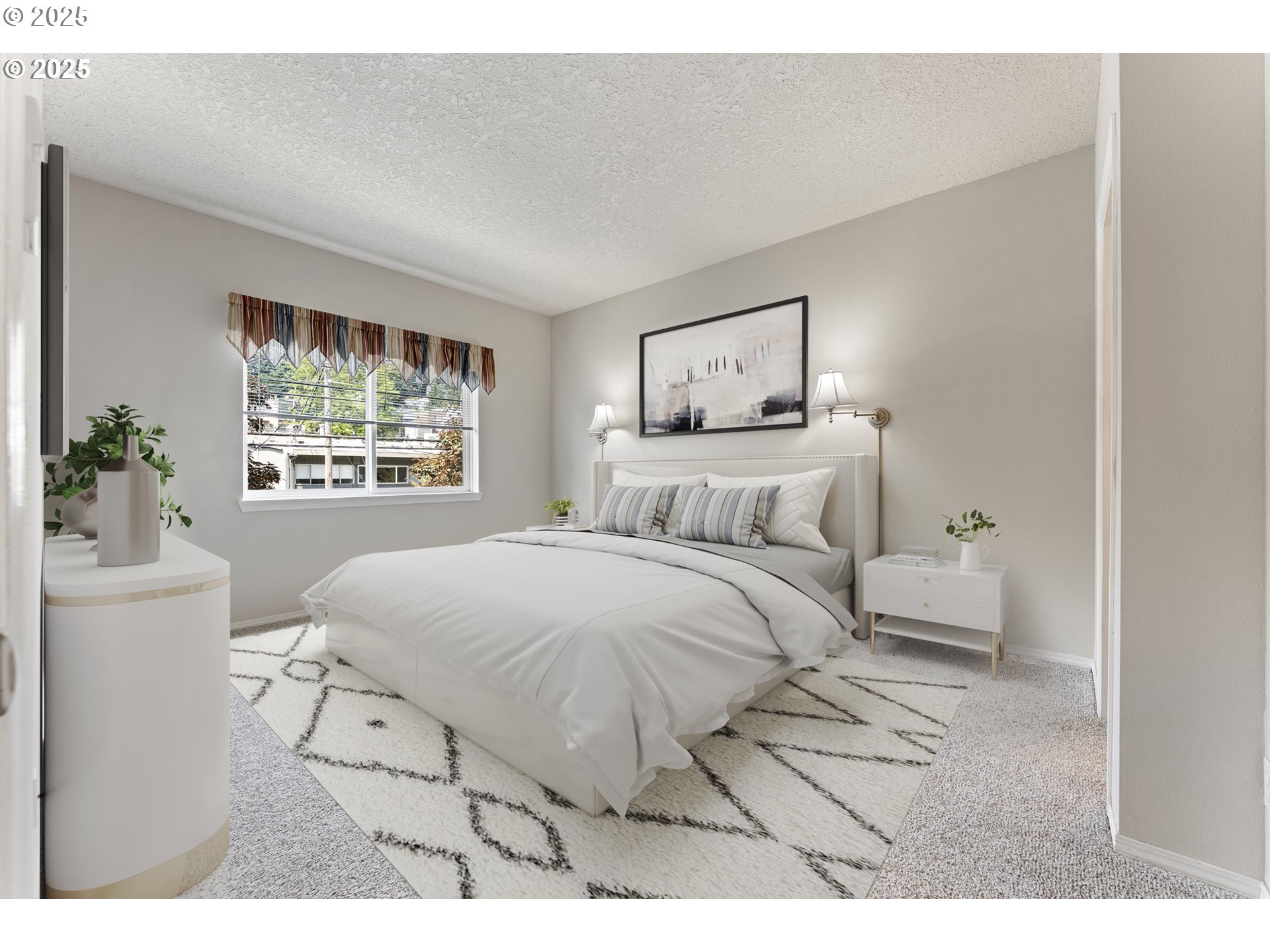 4320 South Corbett Avenue, Unit 202 Portland, OR 97239 - Photo 9 of 33 a bedroom with a bed and a painting on the wall
