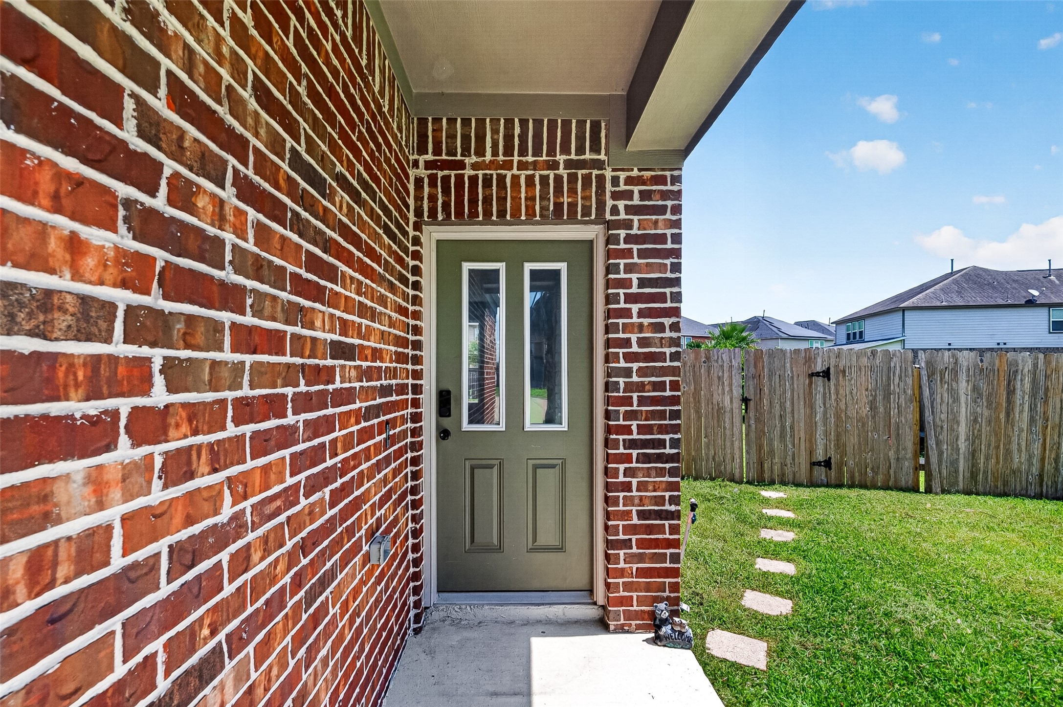 2702 Modano Court Fresno, TX 77545 - Photo 4 of 46 a view of a door and brick walls