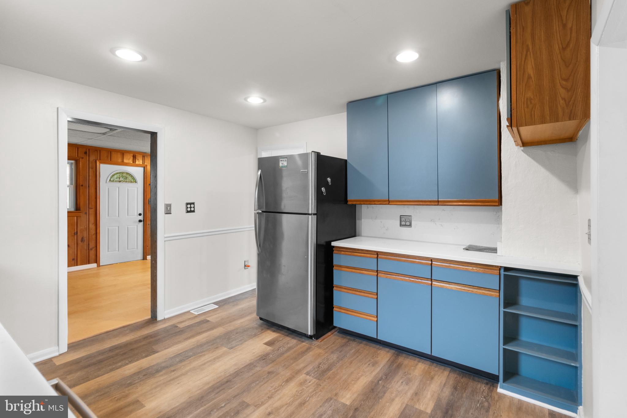 1504 Taylor Avenue, Unit A Parkville, MD 21234 - Photo 12 of 27 a kitchen with a refrigerator and a sink