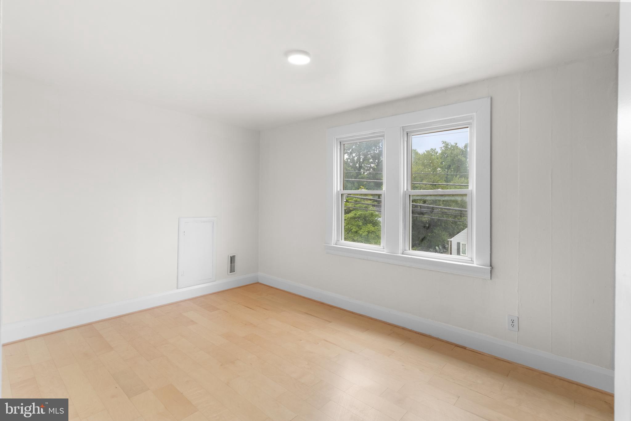 1504 Taylor Avenue, Unit A Parkville, MD 21234 - Photo 15 of 27 an empty room with a window