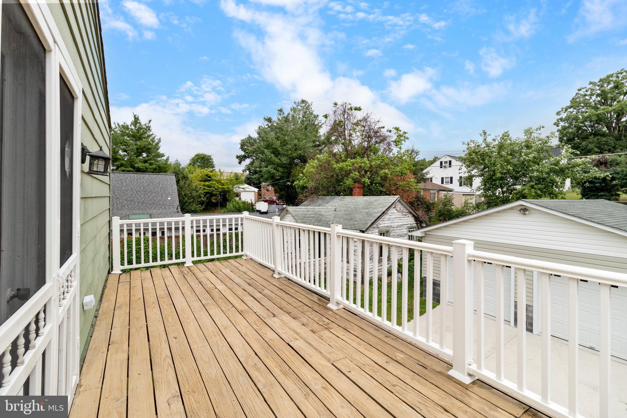 1504 Taylor Avenue, Unit A Parkville, MD 21234 - Photo 27 of 27 a view of a wooden roof with wooden floor and fence