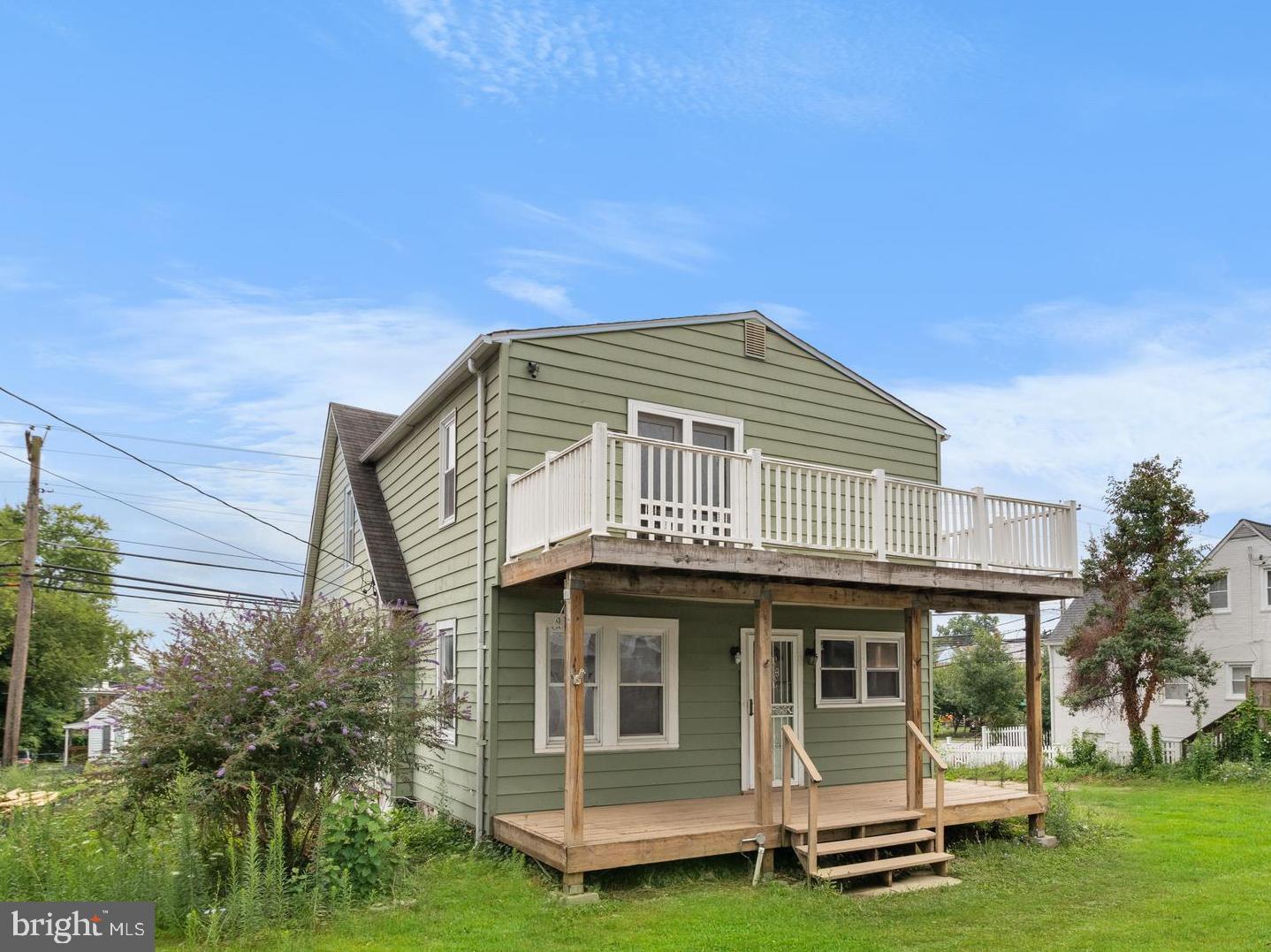1504 Taylor Avenue, Unit A Parkville, MD 21234 - Photo 4 of 27 a front view of a house with garden