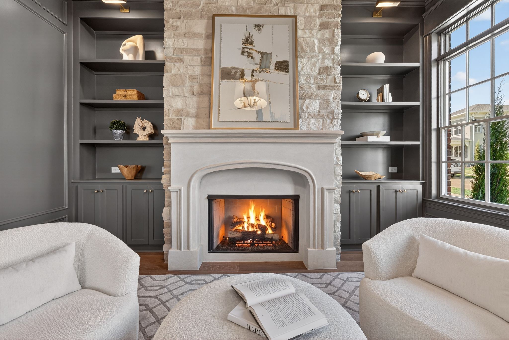 7042 Kinderhook Road Nashville, TN 37221 - Photo 12 of 87 a living room with furniture and a fireplace
