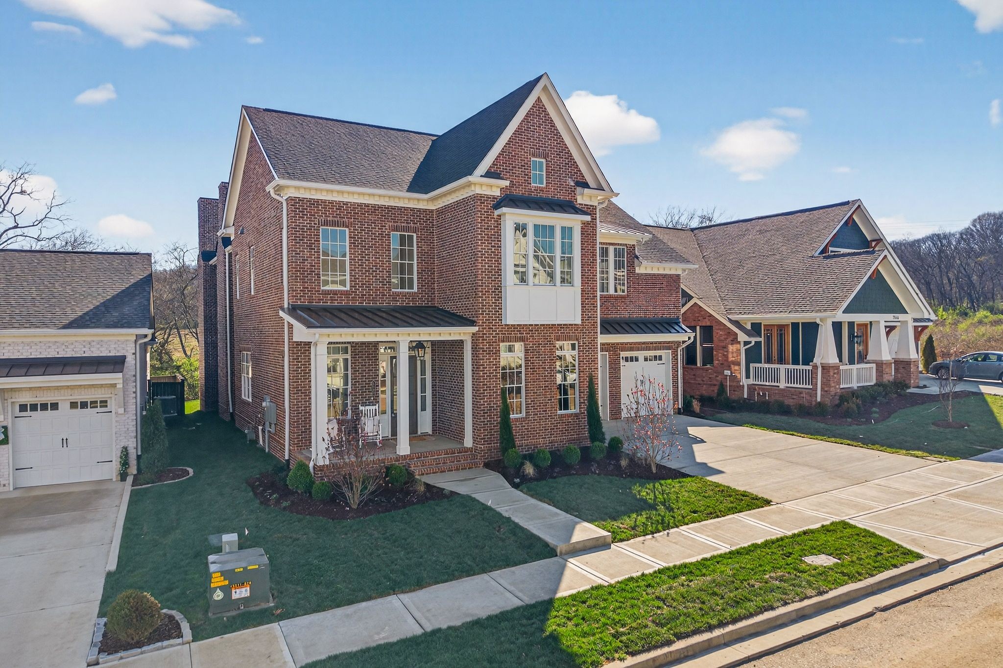 7042 Kinderhook Road Nashville, TN 37221 - Photo 2 of 87 a front view of a house with a yard